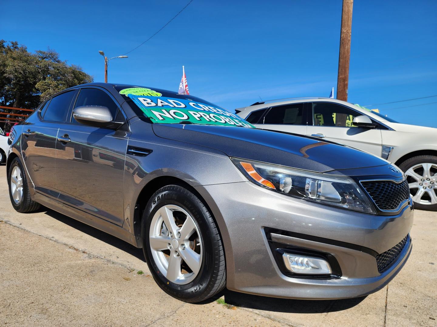 2015 GRAY Kia Optima LX (5XXGM4A77FG) with an 2.4L L4 DOHC 16V engine, 6-Speed Automatic transmission, located at 2660 S.Garland Avenue, Garland, TX, 75041, (469) 298-3118, 32.885551, -96.655602 - Welcome to DallasAutos4Less, one of the Premier BUY HERE PAY HERE Dealers in the North Dallas Area. We specialize in financing to people with NO CREDIT or BAD CREDIT. We need proof of income, proof of residence, and a ID. Come buy your new car from us today!! This is a Very clean 2015 KIA OPTIMA - Photo#1